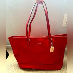 Red large designer coach handbag/purse.